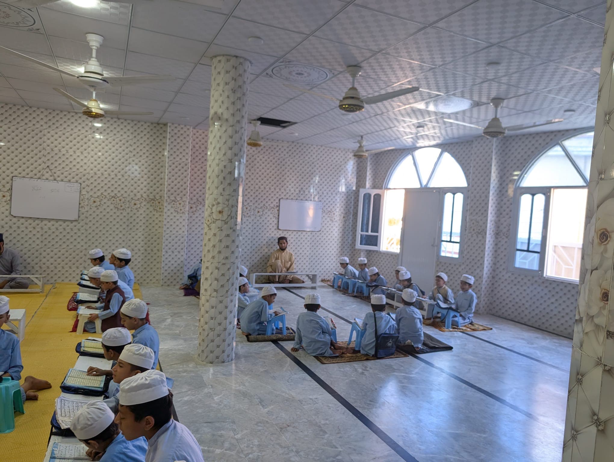 Children study in a renovated classroom